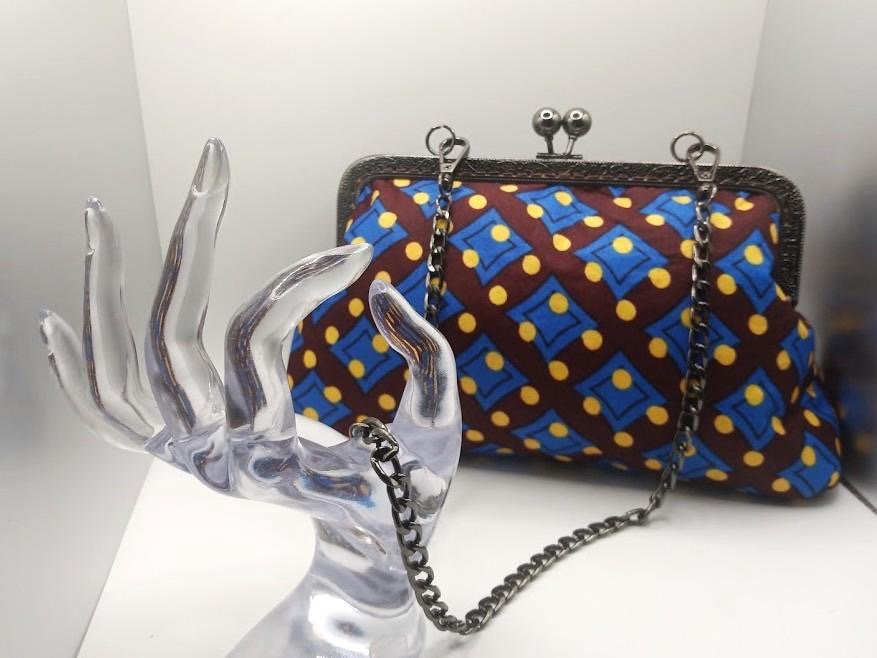 Brown, blue, and yellow geometric Xica handbag with chain strap