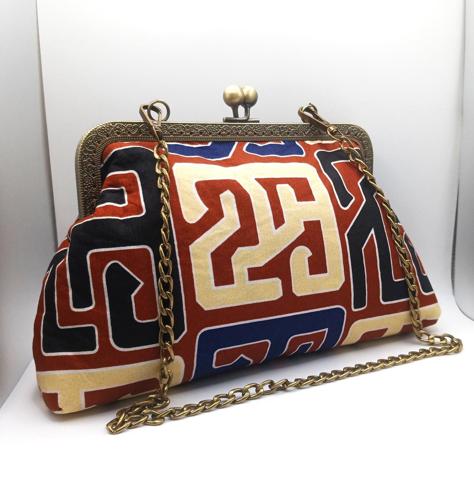 Rust and navy patterned Xica handbag