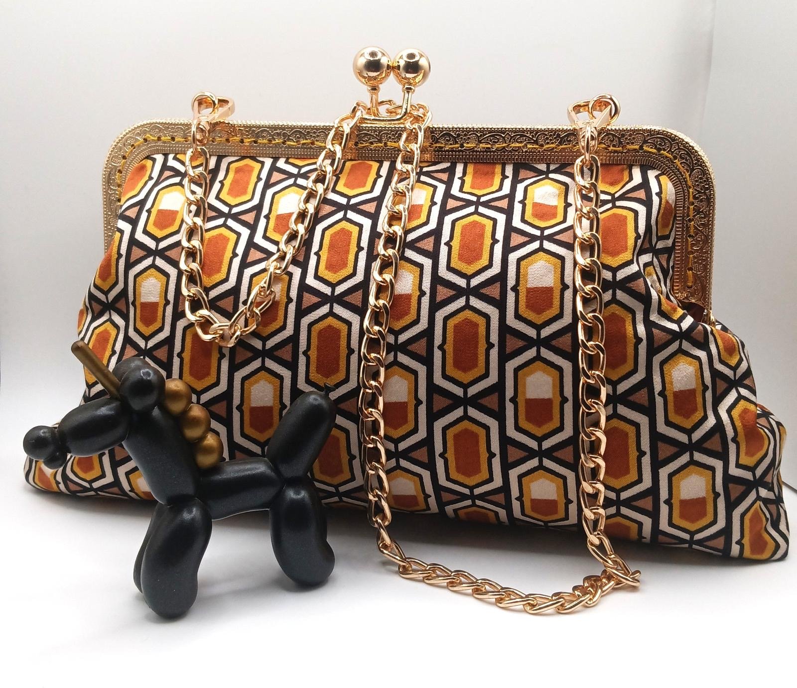 Gold and brown patterned Xica handbag